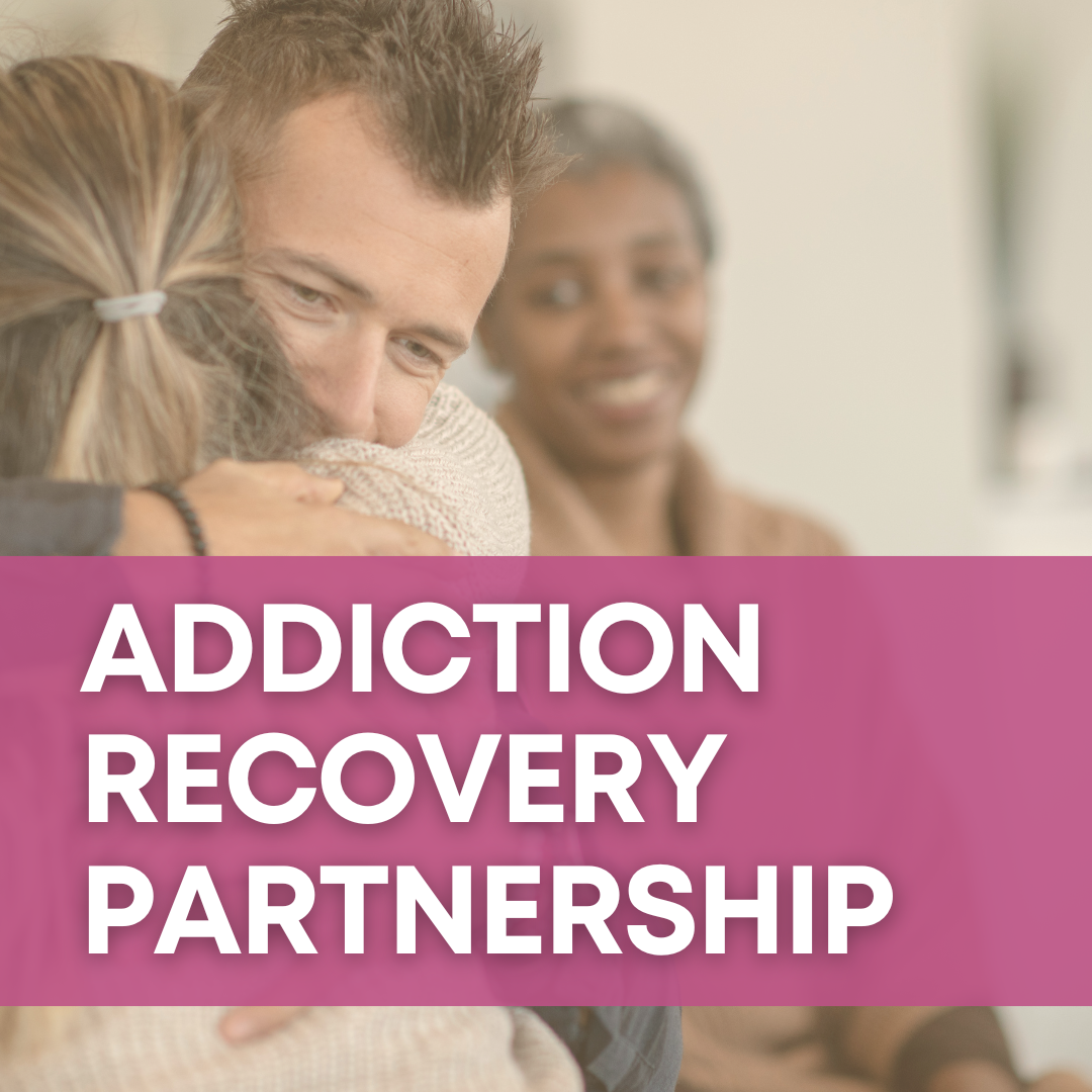 Photo of a man and woman hugging, with a magenta banner over the photo that says "Addiction Recovery Partnership."