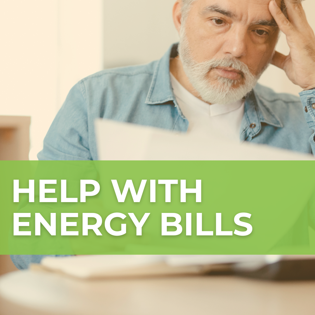 A man puzzles over a piece of paper, and a green banner over the photo says "Help with energy bills."